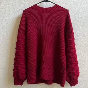 Womens crewneck pullover sweater with loose puff sleeves. Like new.